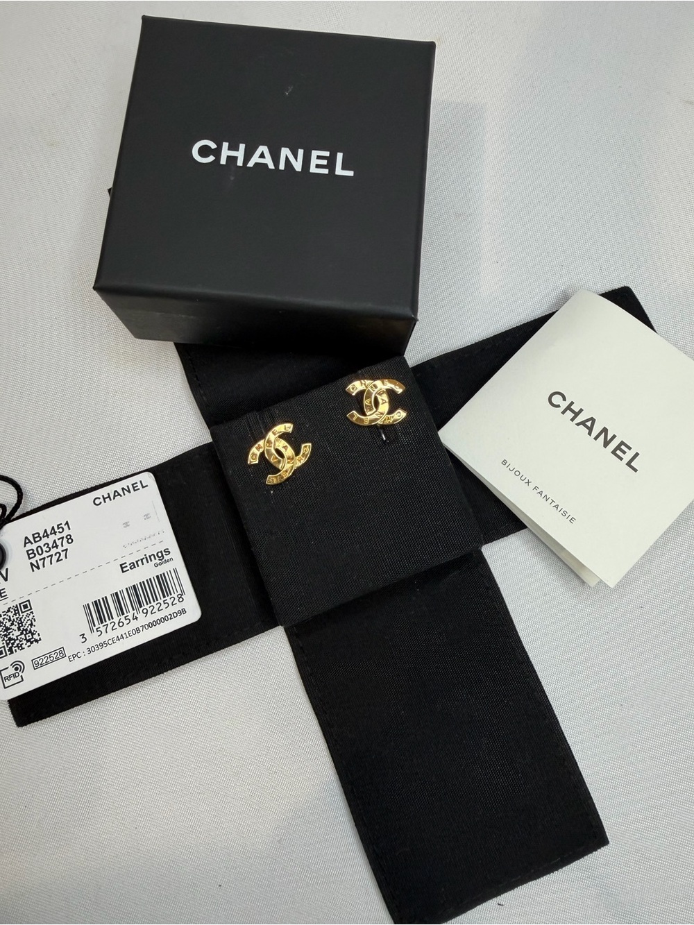 CHANEL Gold Interlocking CC Stud Earrings